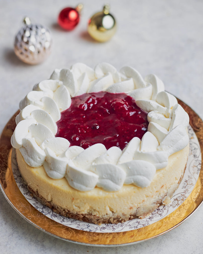 White Chocolate Cheesecake With Berry Compote
